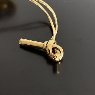 BV Long Clutch Andiamo With Handle In Lambskin Leather Gold Color