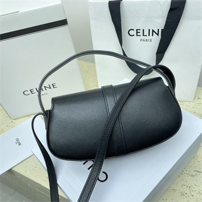 Ce**e clutch on strap tabou in smooth calfskin black