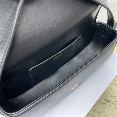 Ce**e clutch on strap tabou in smooth calfskin black