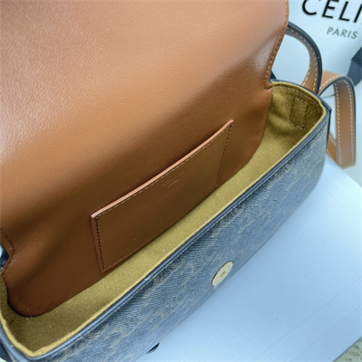 Ce**e clutch on strap tabou in triomphe canvas and calfskin tan