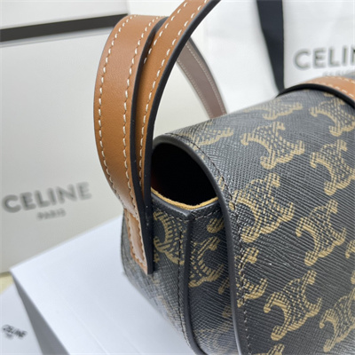 Ce**e clutch on strap tabou in triomphe canvas and calfskin tan