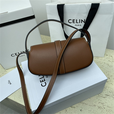 Ce**e clutch on strap tabou in smooth calfskin tan