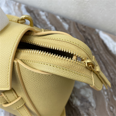 Ce**e micro belt bag in yellow grained calfskin