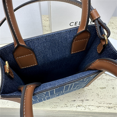 Ce**e mini vertical cabas in denim with Ce**e all over print navy/tan