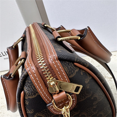 Ce**e small boston bag in triomphe canvas and calfskin tan