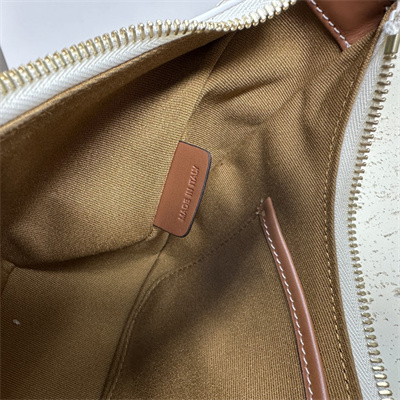 Ce**e medium ava triomphe bag in triomphe canvas and calfskin white