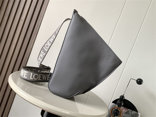 l0ew* anton sling bag in S*pple smooth calf and jacquard