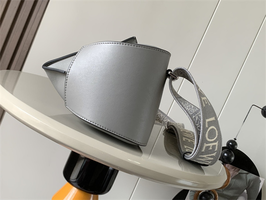 l0ew* anton sling bag in S*pple smooth calf and jacquard