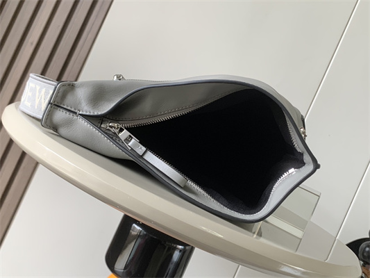 l0ew* anton sling bag in S*pple smooth calf and jacquard