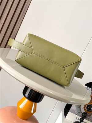 L0ew* puzzle fold wash bag in shinny calfskin