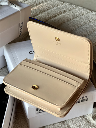 Ce**e triomphe compact wallet in shiny calfskin beige