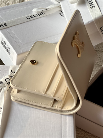 Ce**e triomphe compact wallet in shiny calfskin cream
