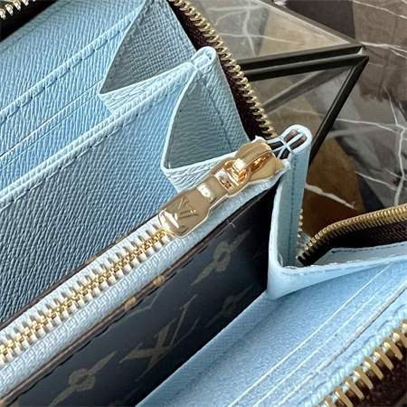 L.V Zippy Wallet Vivienne Holidays Monogram Canvas M12223