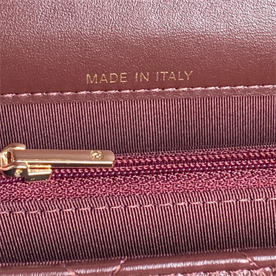 Ch*el clutch with chain lambskin, strass & gold-tone metal burgundy ap4293