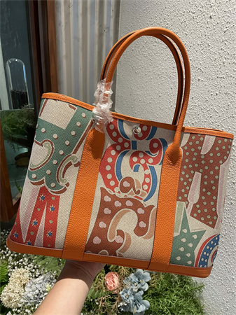 Her.mes Garden Party 36CM Togo Leather and Graffiti Canvas HS