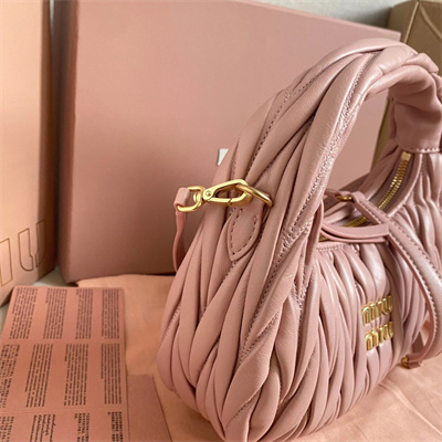 M*um*u wander matelassé nappa leather small hobo bag powder pink color