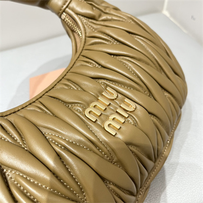 M*um*u wander matelassé nappa leather small hobo bag caramel color