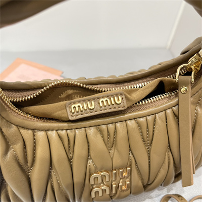 M*um*u wander matelassé nappa leather small hobo bag caramel color