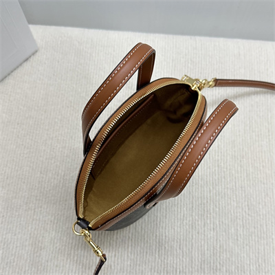 Ce**e oval bag in triomphe canvas and calfskin