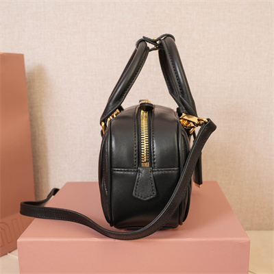 M*um*u arcadie matelassé nappa leather top handle bag black color