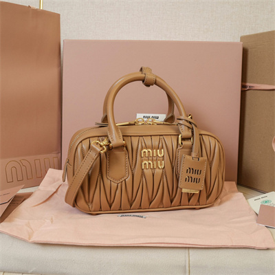 M*um*u arcadie matelassé nappa leather top handle bag caramel color