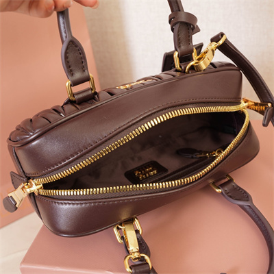 M*um*u arcadie matelassé nappa leather top handle bag briarwood color