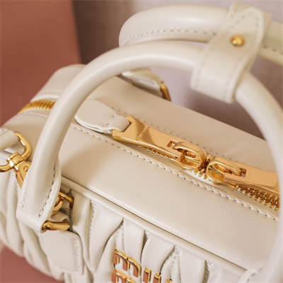M*um*u arcadie matelassé nappa leather top handle bag white color