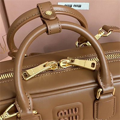 M*um*u arcadie leather top handle bag cognac color