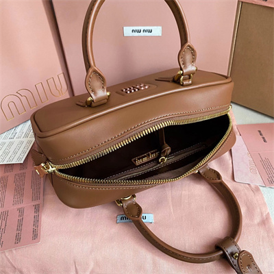 M*um*u arcadie leather top handle bag cognac color