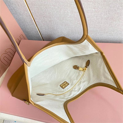 M*um*u ivy leather bag cognac color